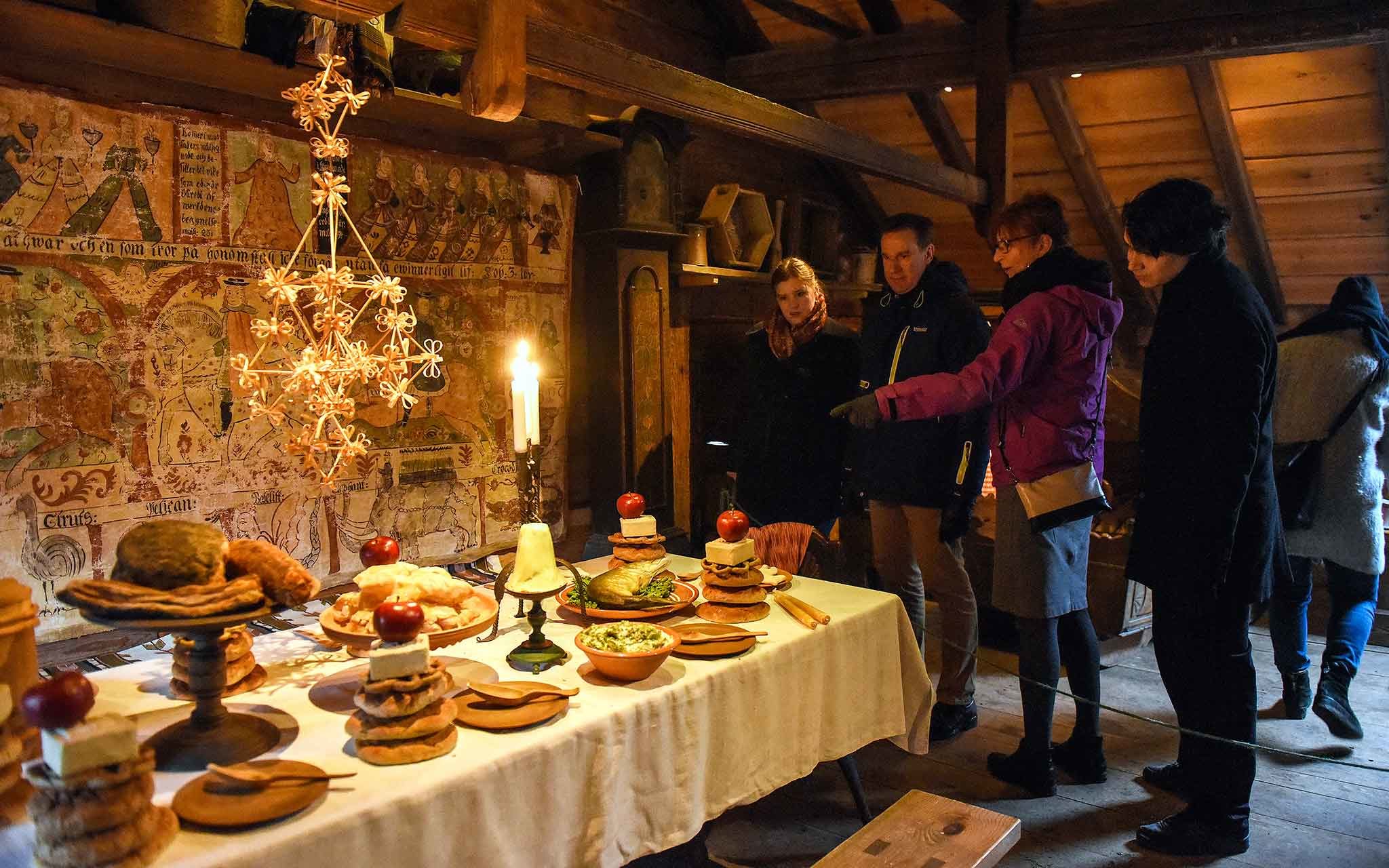 The Christmas table is set in a farmhouse in the beginning of the 19th century